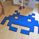 Illustration for article titled A Retro Rug That Only Battles Dirty Shoes, Not Invaders From Space